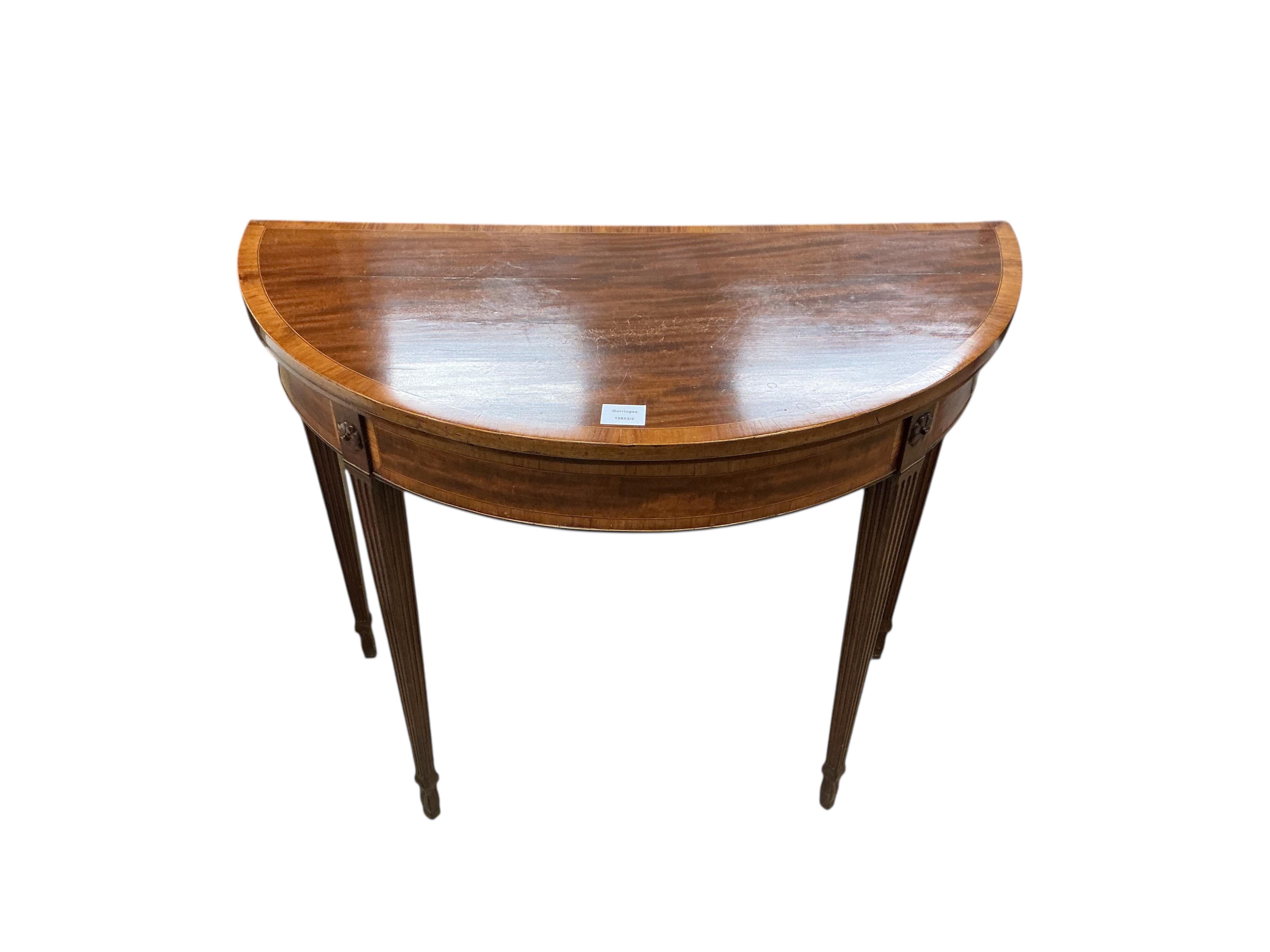 A George III satinwood banded mahogany D shaped folding card table, width 91cm, depth 45cm, height 76cm